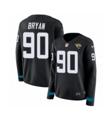 Women's Nike Jacksonville Jaguars #90 Taven Bryan Limited Black Therma Long Sleeve NFL Jersey